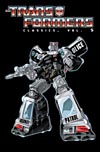 Transformers Classics, volume 5, trade paperback, cover by Guido Guidi. Click to see a larger scan!